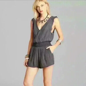 Free People Soft Surplice Romper XS Dark Gray Elastic Waist Raw Edge Distressed
